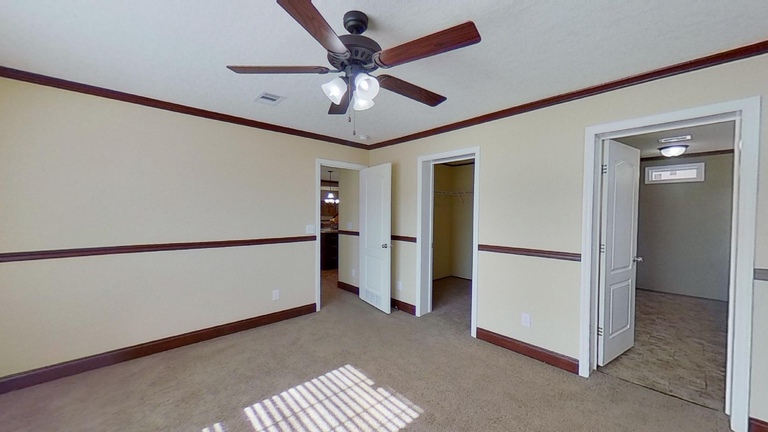 Piper 28644A | 4 bedroom, 2 bathroom, 1707 sqft home | Built by Cavco - Moultrie in Moultrie, GA.
