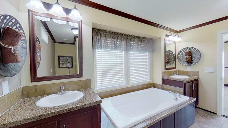 Piper 28644A | 4 bedroom, 2 bathroom, 1707 sqft home | Built by Cavco - Moultrie in Moultrie, GA.