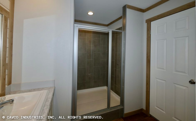 Highmark 18763B | 3 bedroom, 2 bathroom, 1292 sqft home | Built by Cavco - Lancaster in Lancaster, TX.
