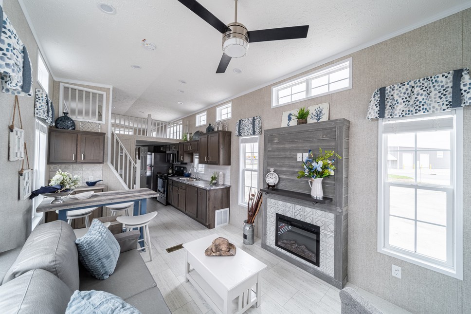 Park Model 190011 by Fairmont is simply stunning - from the loft to the fireplace to the front door.