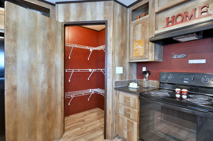Alamo Lite 28563T | 3 bedroom, 2 bathroom, 1493 sqft home. Built by Cavco - Seguin in Seguin, TX.