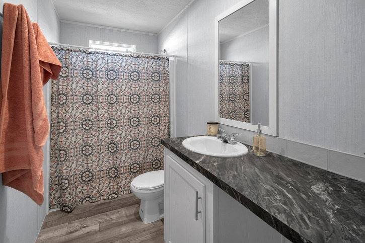Valu Premier 32684G | 4 bedroom, 2 bathroom, 2085 sqft home | Built by Cavco - Seguin in Seguin, TX.