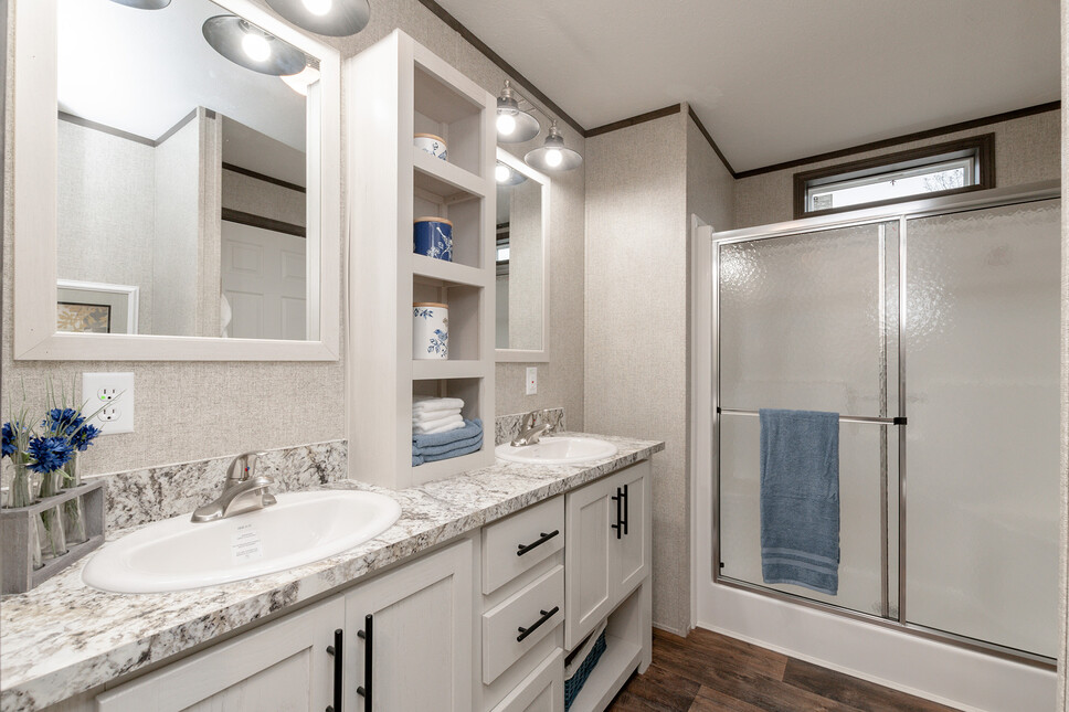 Light and bright master bath in the Shoreview model by Friendship Homes