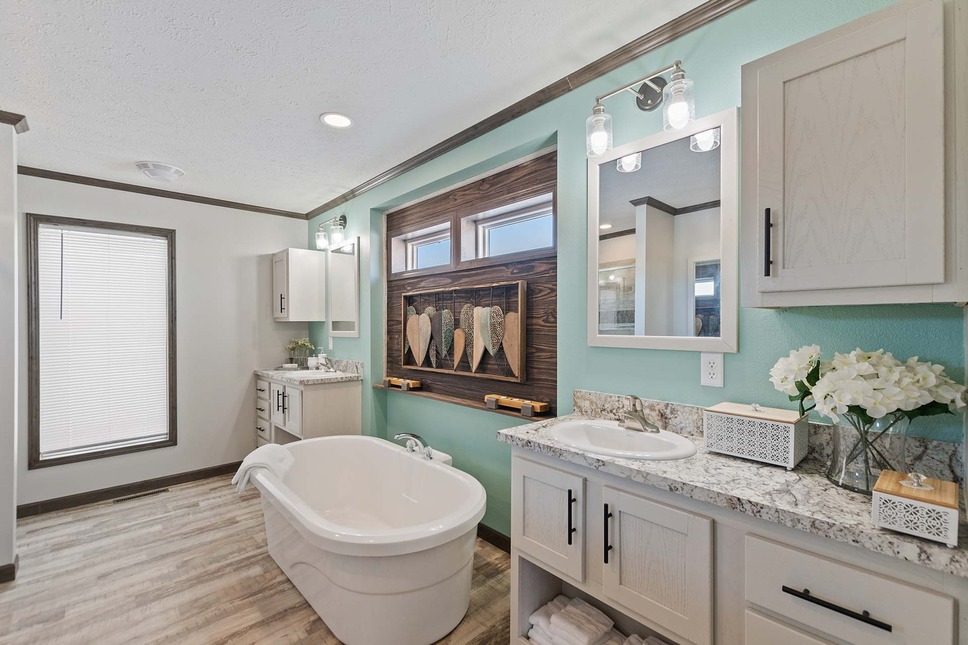 Dual vanities and a stand-alone tub in the Winchester 184021 model