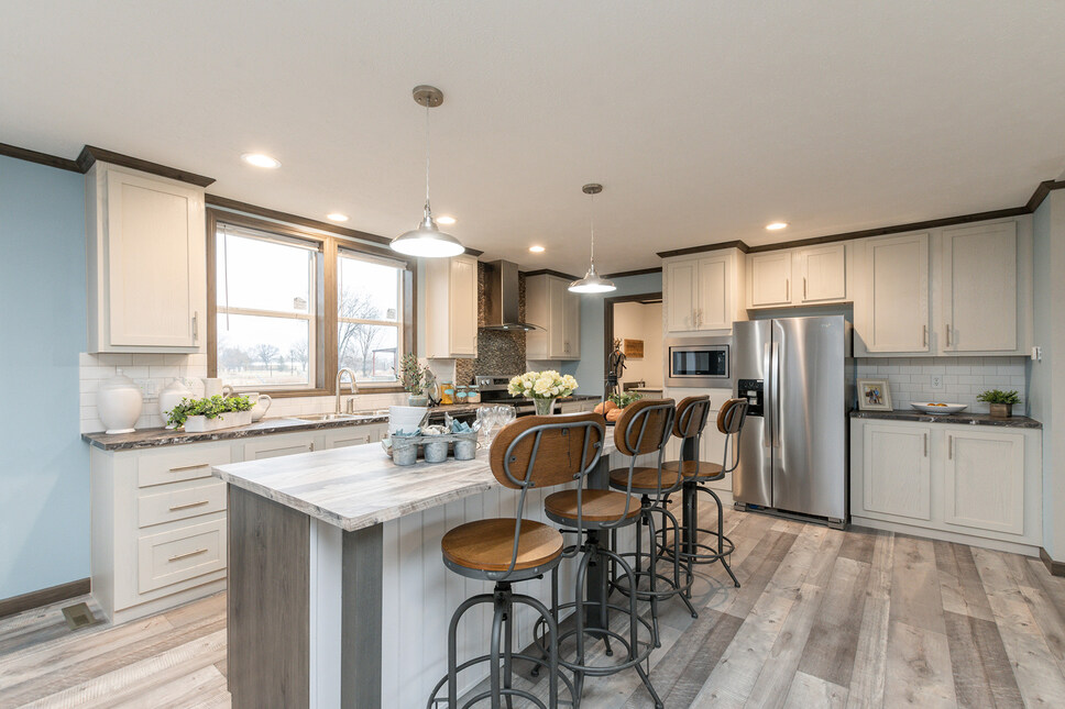 Country casual kitchen with all the right touches in the Shoreview model by Friendship Homes