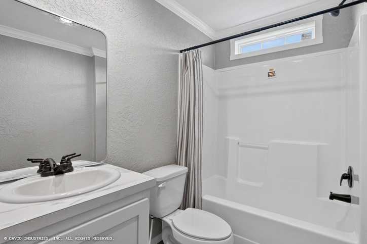 Emerald 28603A | 3 bedroom, 2 bathroom, 1660 sqft home. Built by Cavco - Duncan in Duncan, OK.