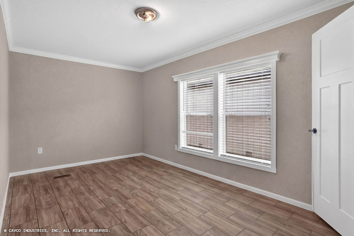 Emerald 28603A | 3 bedroom, 2 bathroom, 1660 sqft home. Built by Cavco - Duncan in Duncan, OK.