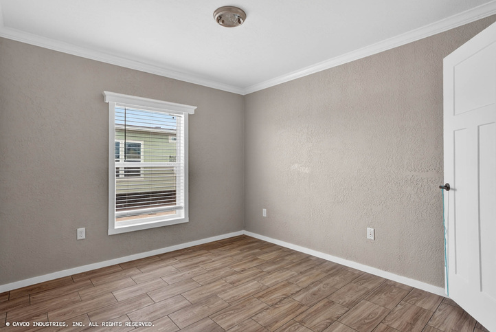 Emerald 28603A | 3 bedroom, 2 bathroom, 1660 sqft home. Built by Cavco - Duncan in Duncan, OK.