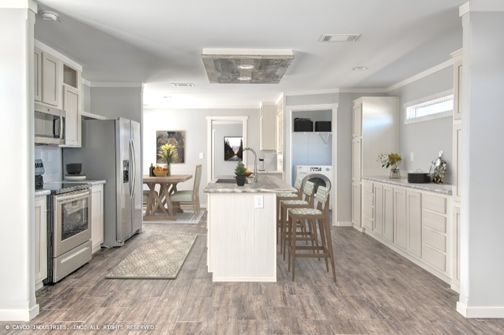Banyan 18763A | 3 bedroom, 2 bathroom, 1292 sqft home. Built by Cavco - Lancaster in Lancaster, TX.