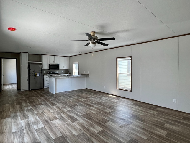 ValuHomes Limited 16763V | 3 bedroom, 2 bathroom, 1140 sqft home | Built by Cavco - Waco in Waco, TX.