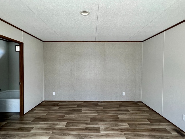 ValuHomes Limited 16763V | 3 bedroom, 2 bathroom, 1140 sqft home | Built by Cavco - Waco in Waco, TX.