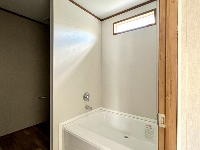 ValuHomes Limited 16763V | 3 bedroom, 2 bathroom, 1140 sqft home | Built by Cavco - Waco in Waco, TX.