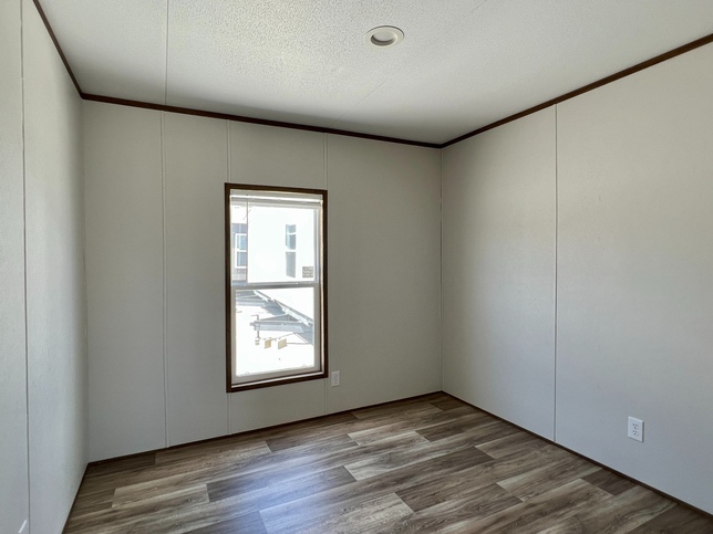 ValuHomes Limited 16763V | 3 bedroom, 2 bathroom, 1140 sqft home | Built by Cavco - Waco in Waco, TX.
