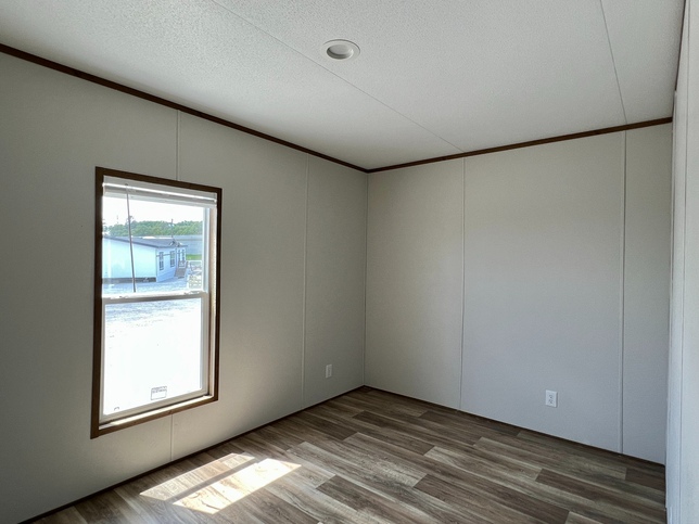 ValuHomes Limited 16763V | 3 bedroom, 2 bathroom, 1140 sqft home | Built by Cavco - Waco in Waco, TX.