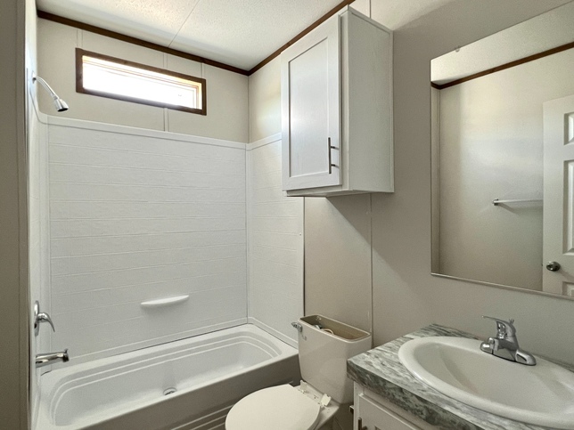 ValuHomes Limited 16763V | 3 bedroom, 2 bathroom, 1140 sqft home | Built by Cavco - Waco in Waco, TX.