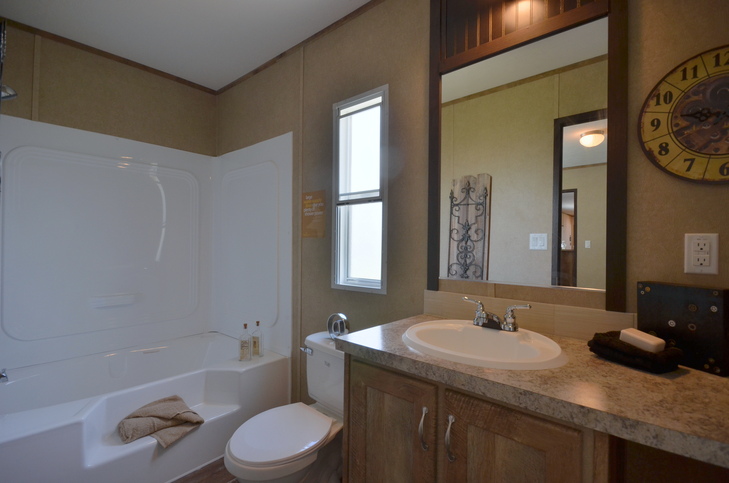 Alamo Lite 16562T | 2 bedroom, 2 bathroom, 859 sqft home. Built by Cavco - Seguin.