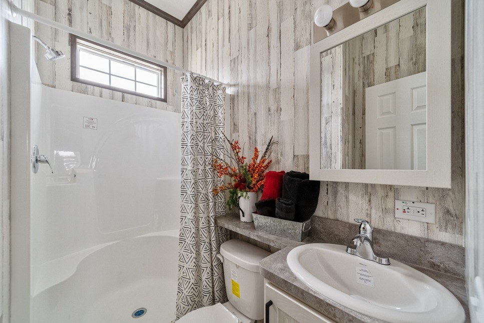 Large walk-in shower in the 190002 Cavco 150 from Fairmont Homes.