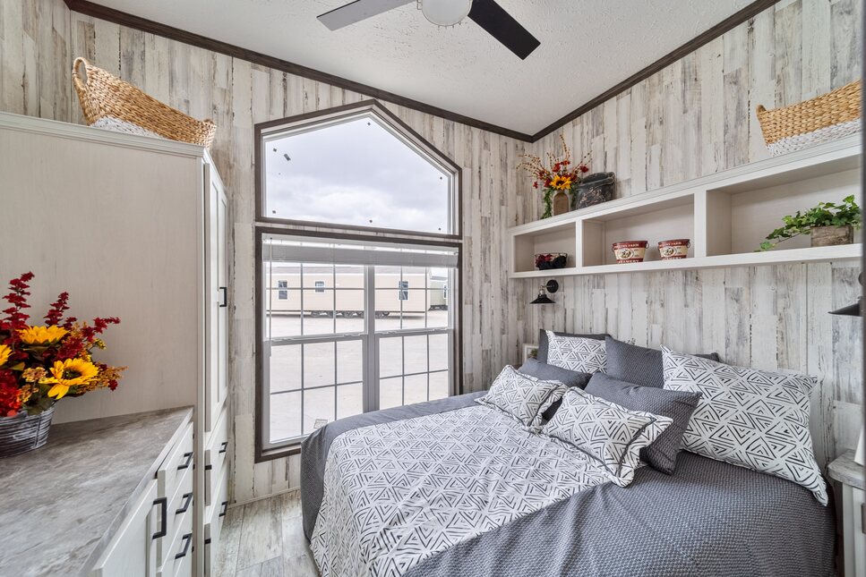 Great use of space in the bedroom of the 190002 Cavco 150 from Fairmont Homes.
