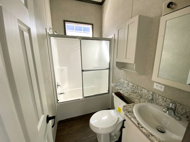 ONE of TWO bathrooms in the 190012 Cavco 150 from Fairmont Homes.