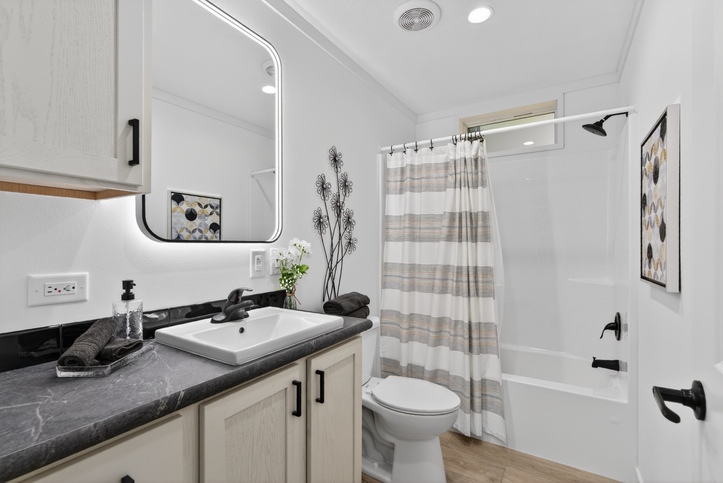 Aura 28644N | 4 bedroom, 3 bathroom, 1706 sqft home. Built by Cavco - Nampa in Nampa, ID. Nationally Available Model.