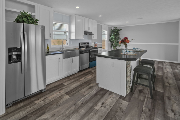 Alamo Lite 28724T | 4 bedroom, 2 bathroom, 1920 sqft home. Built by Cavco - Seguin in Seguin, TX.