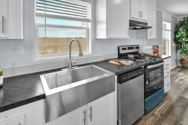 Alamo Lite 28724T | 4 bedroom, 2 bathroom, 1920 sqft home. Built by Cavco - Seguin in Seguin, TX.