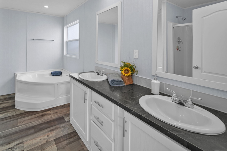 Alamo Lite 28724T | 4 bedroom, 2 bathroom, 1920 sqft home. Built by Cavco - Seguin in Seguin, TX.