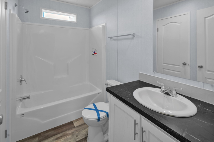 Alamo Lite 28724T | 4 bedroom, 2 bathroom, 1920 sqft home. Built by Cavco - Seguin in Seguin, TX.