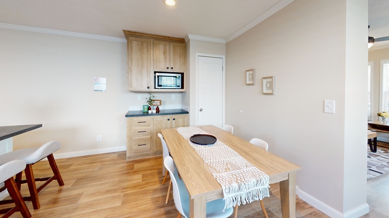 Black line for the Roanoke Duplex. First Nationally Available HUD Approved Duplex | Side A: 2 bedroom, 1 bathroom, 1050 sqft | Side B: 2 bedroom, 1 bathroom, 1050 sqft. Opposite side porches.