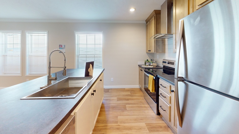 Black line for the Roanoke Duplex. First Nationally Available HUD Approved Duplex | Side A: 2 bedroom, 1 bathroom, 1050 sqft | Side B: 2 bedroom, 1 bathroom, 1050 sqft. Opposite side porches.
