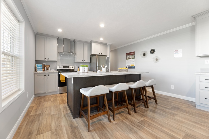 Black line for the Roanoke Duplex. First Nationally Available HUD Approved Duplex | Side A: 2 bedroom, 1 bathroom, 1050 sqft | Side B: 2 bedroom, 1 bathroom, 1050 sqft. Opposite side porches.