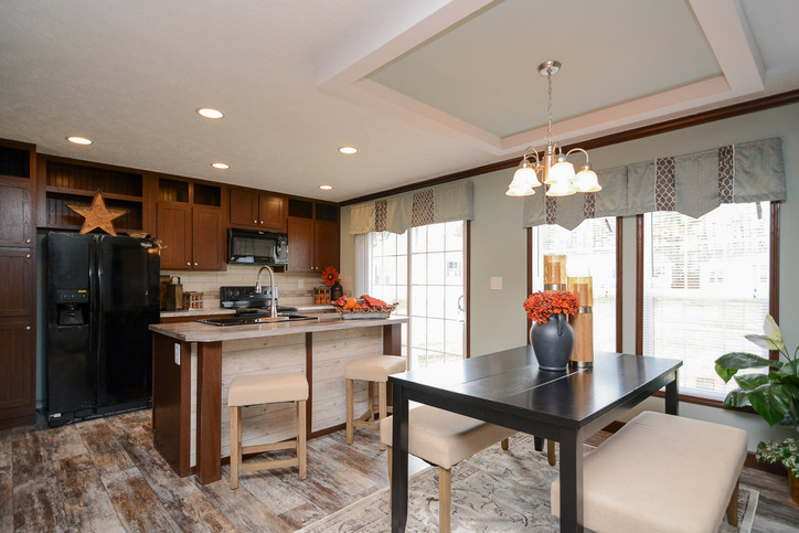 Velocity 28563K | 3 bedroom, 2 bathroom, 1484 sqft home | Built by Cavco - Rocky Mount in Rocky Mount, VA. - Kitchen & Dining Area