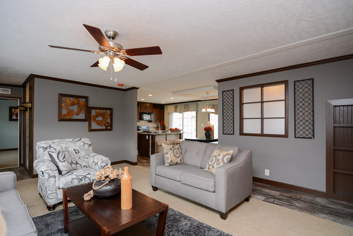 Velocity 28563K | 3 bedroom, 2 bathroom, 1484 sqft home | Built by Cavco - Rocky Mount in Rocky Mount, VA. - Living Room toward Kitchen
