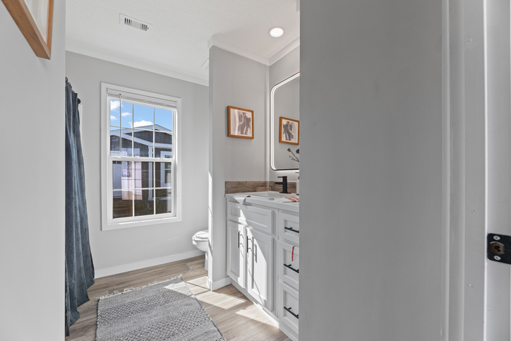Helix 16763N | 3 bedroom, 2 bathroom, 1178 sqft home | Built by Cavco - Moultrie in Moultrie, GA.