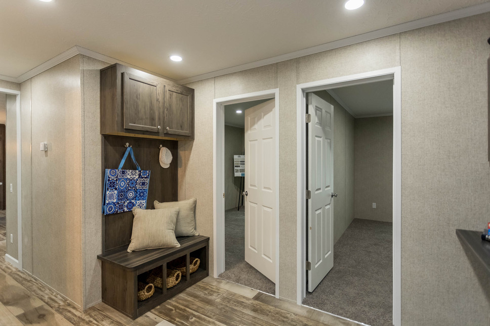 Handy hall storage in the Inspiration Goddard Model186029 by Fairmont Homes