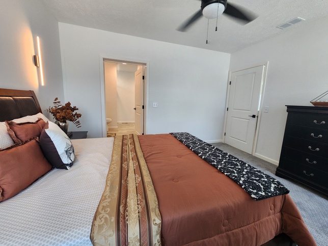 Luxury meets thoughtful design in the owner's suite, where 36" wide doors to the bedroom and bathroom were added for convenience, accessibility, and lasting comfort!

#ABetterWayToBuild