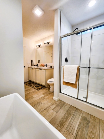 The primary bathroom in the Essence 1 can be personalized in several ways. We chose to feature a spa-inspired design with a freestanding soaking tub and a generous 54" ceramic tile shower.

#ABetterWayToBuild