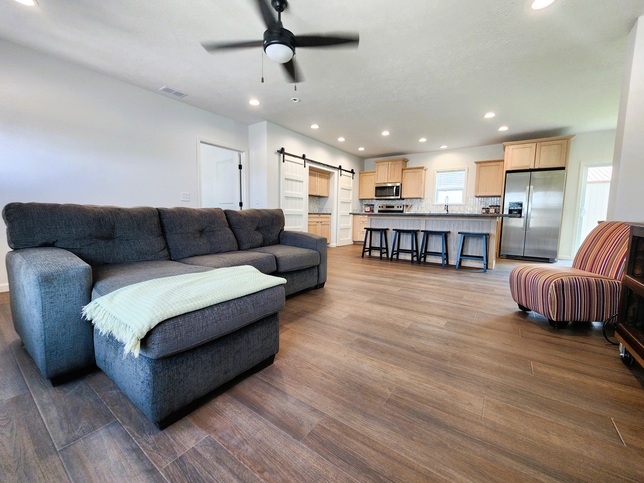 Upgraded with Luxury Vinyl Plank Flooring and soaring 8½-Foot Ceilings, this floor plan feels open, bright, and inviting.

#ABetterWayToBuild
