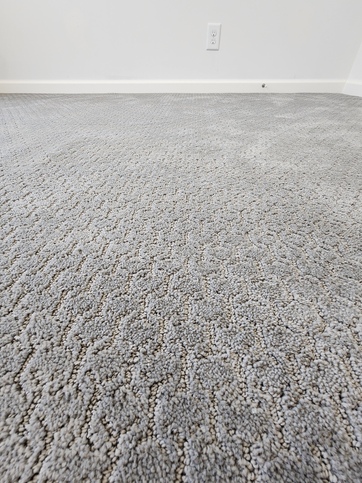 Soft underfoot and built to last, the upgraded 30 oz. textured carpet adds warmth, comfort, and everyday durability where it matters most.

#ABetterWayToBuild