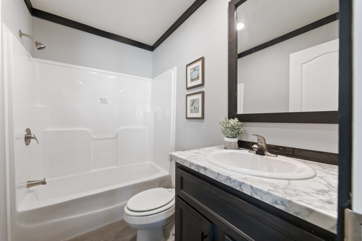 Sparrow 32725A | 5 bedroom, 3 bathroom, 2136 sqft home | Built by Cavco - Moultrie in Moultrie, GA.