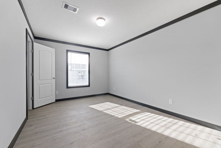 Sparrow 32725A | 5 bedroom, 3 bathroom, 2136 sqft home | Built by Cavco - Moultrie in Moultrie, GA.