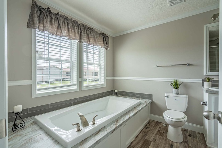 Kimbrel 28764A | 4 bedroom, 2 bathroom, 2026 sqft home | Built by Cavco - Moultrie in Moultrie, GA.