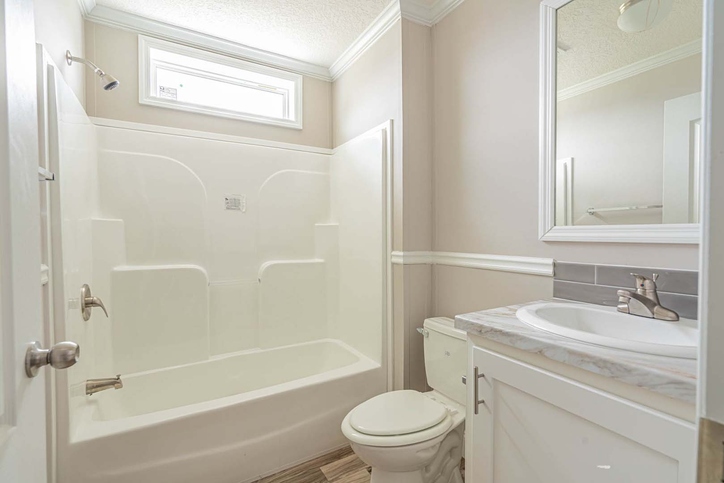 Kimbrel 28764A | 4 bedroom, 2 bathroom, 2026 sqft home | Built by Cavco - Moultrie in Moultrie, GA.