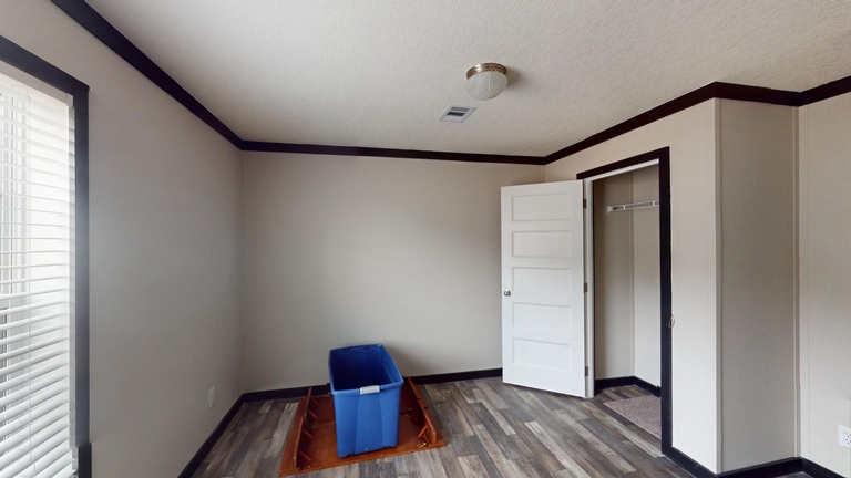 Banning 28724A | 4 bedroom, 3 bathroom, 1920 sqft home | Built by Cavco - Moultrie in Moultrie, GA.