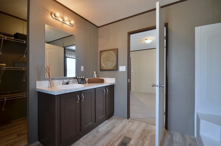 Alamo Lite 16763B | 3 bedroom, 2 bathroom, 1165 sqft home. Built by Cavco - Seguin in Seguin, TX.